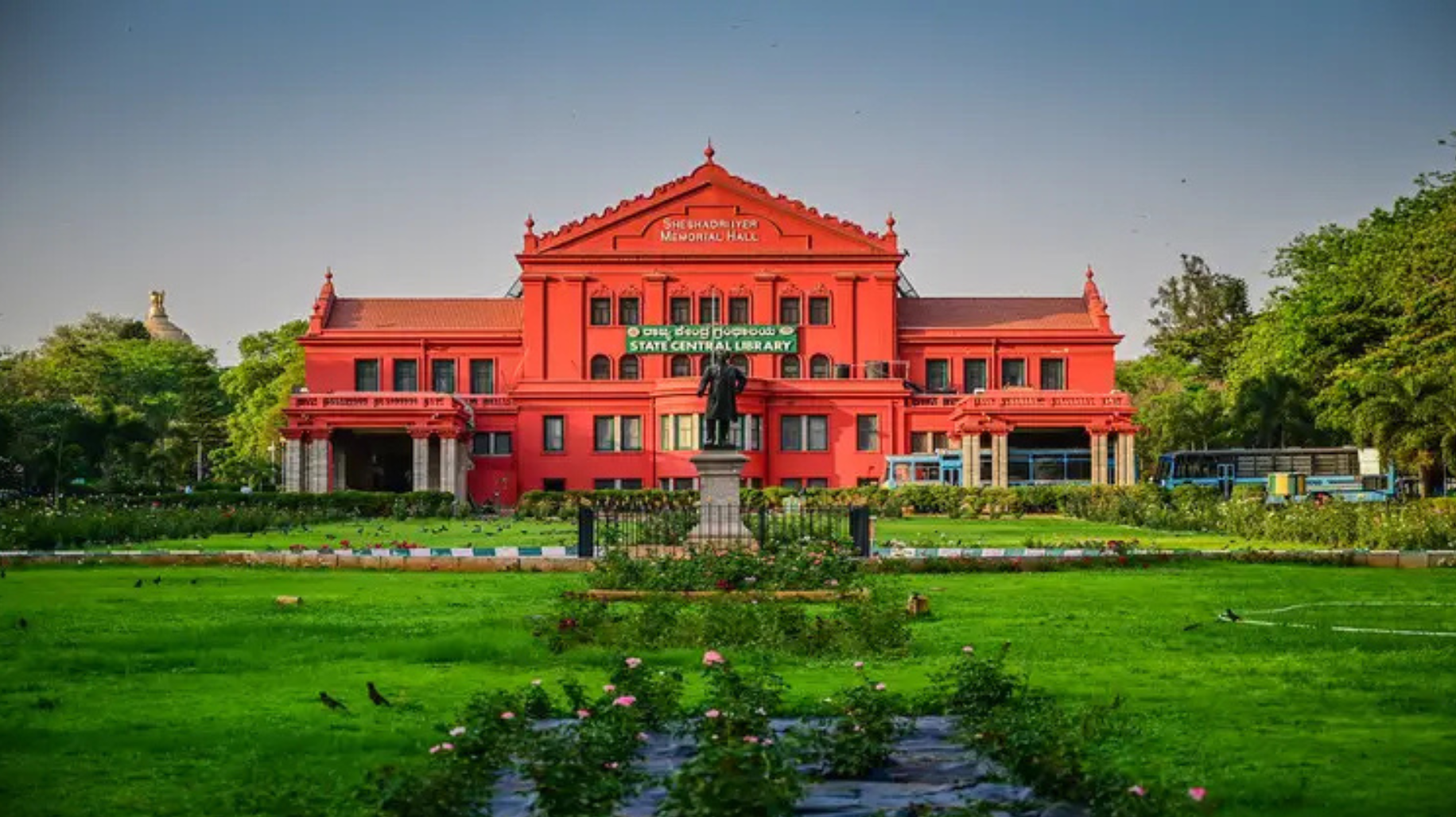 Cubbon Park greenery and red library building